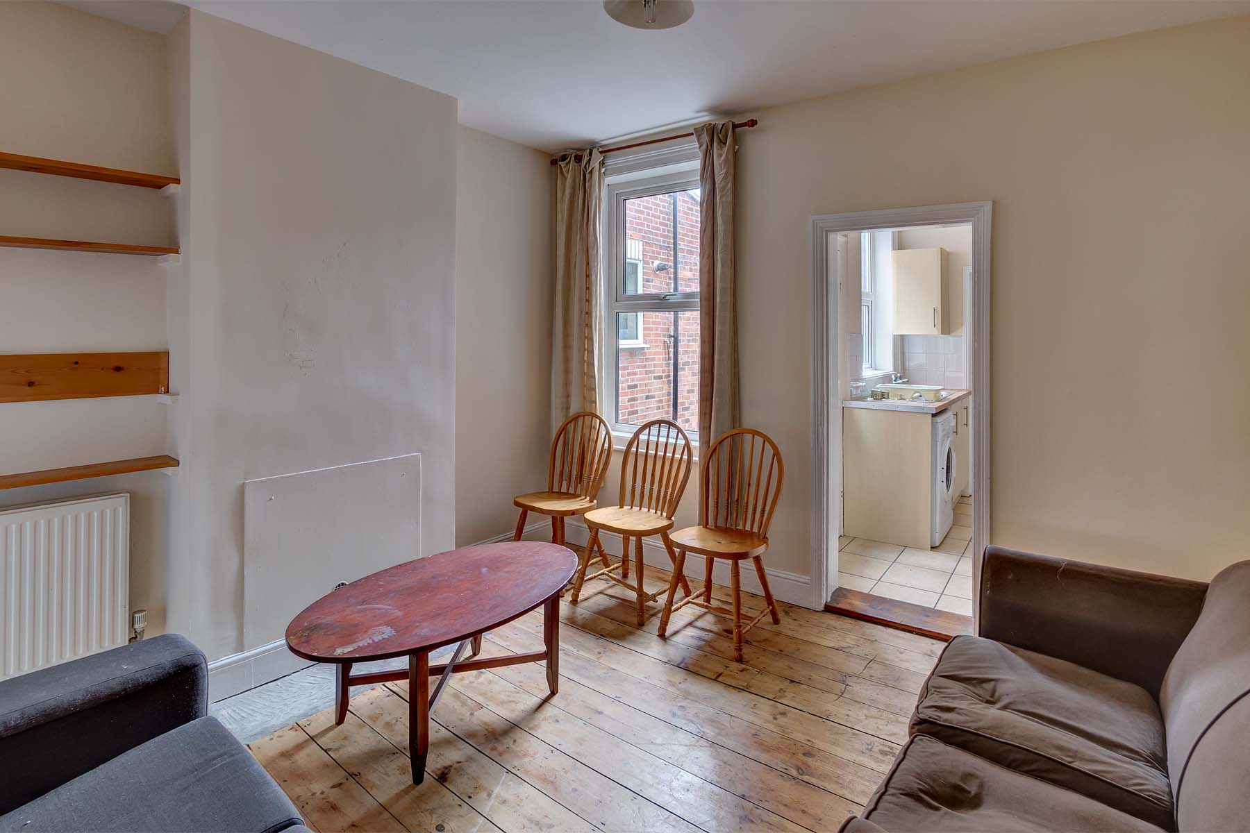 Living/Dining room with sofa and dining set