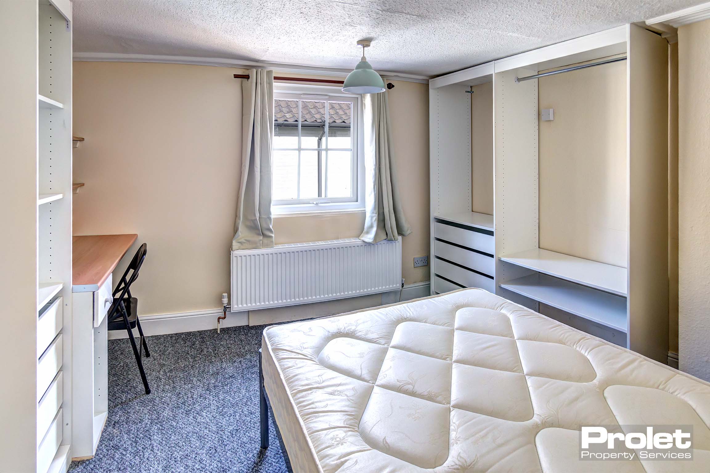 Double bedroom with built in furnishings