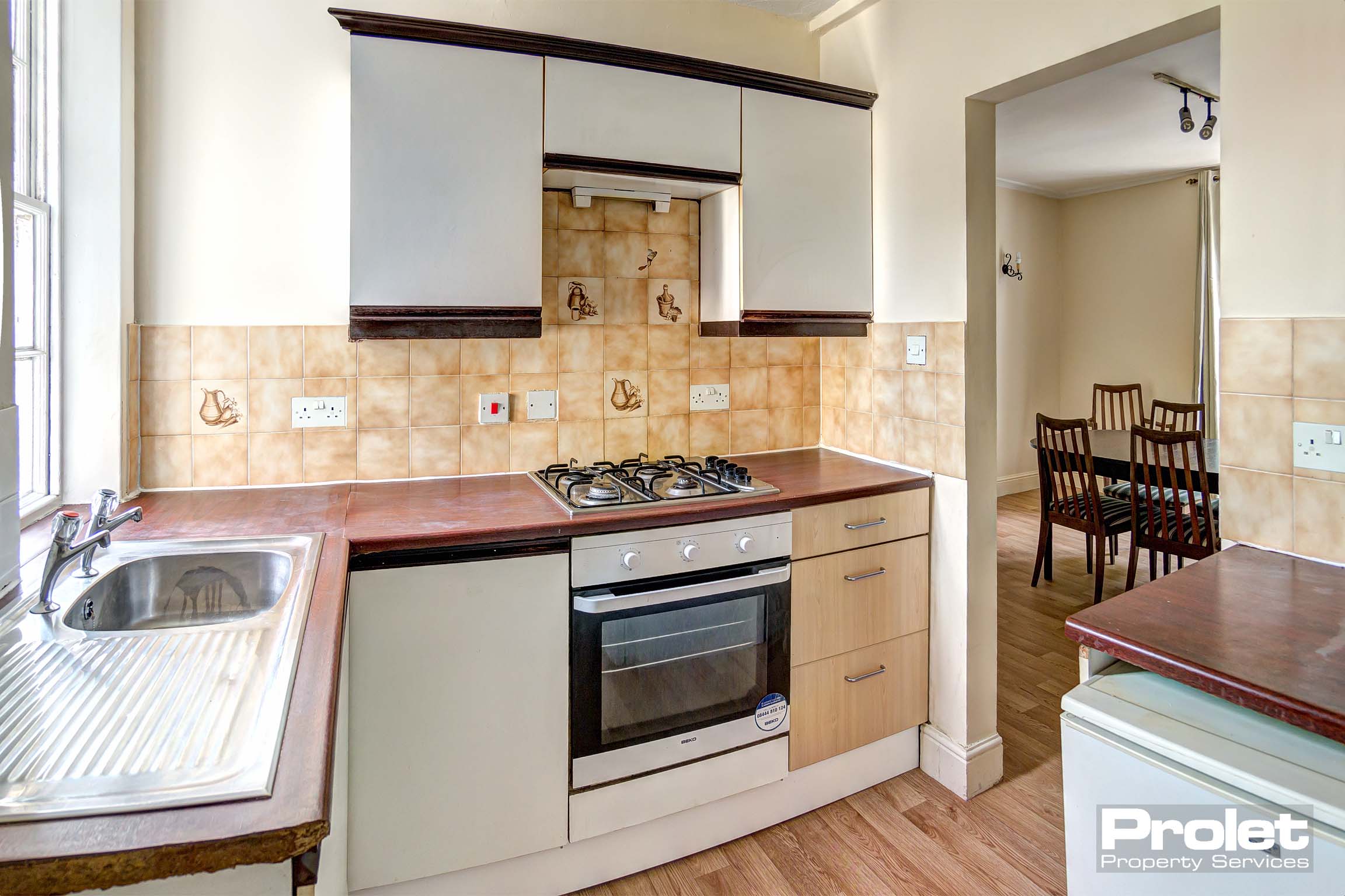 Kitchen with white cabinets
