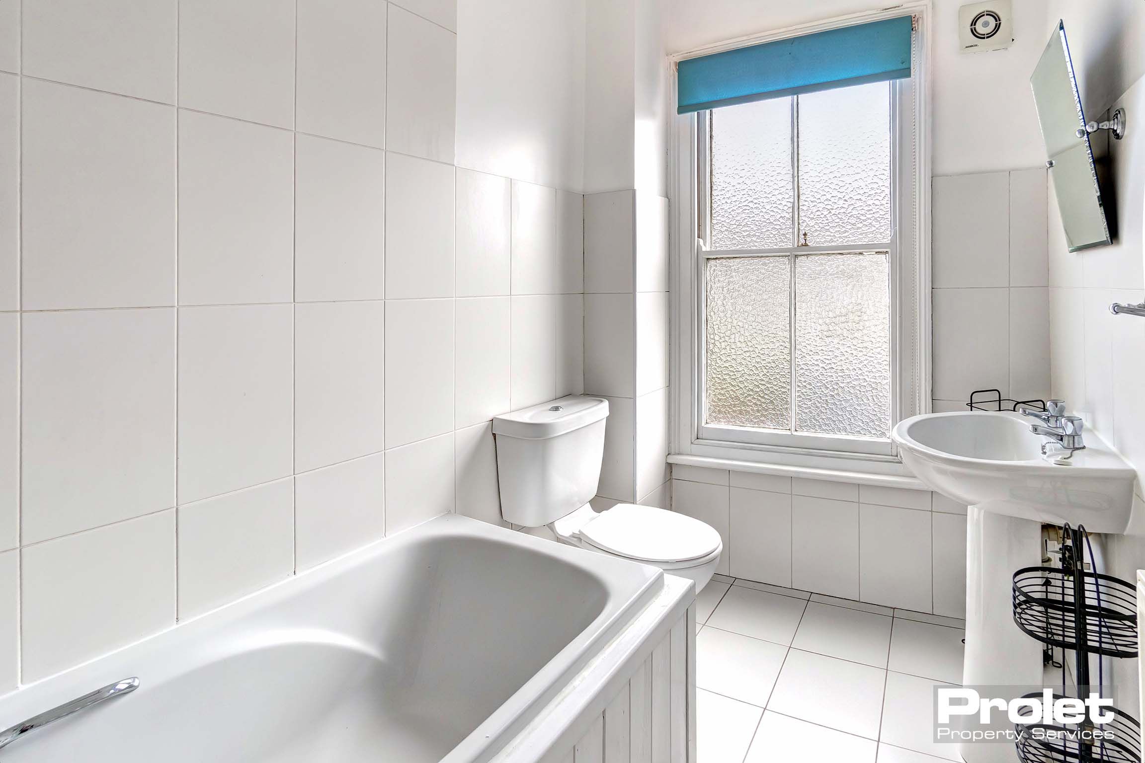 Bathroom with toilet and bath
