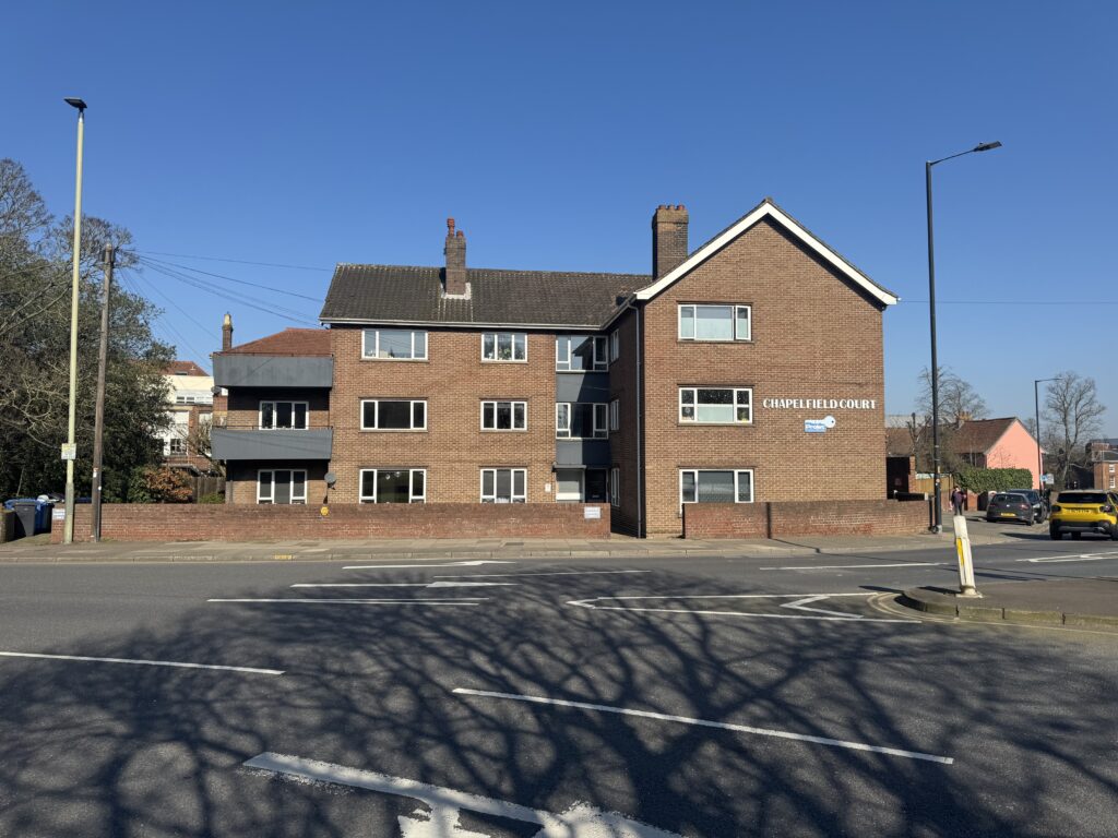 Exterior of chapelfield court, small block of flats on roundabout