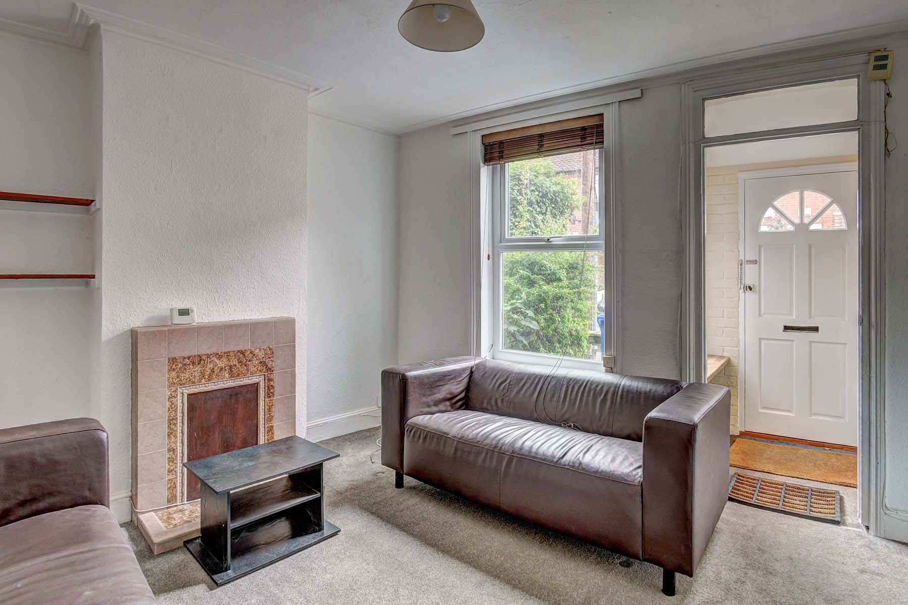 Living room with sofas and tv stand