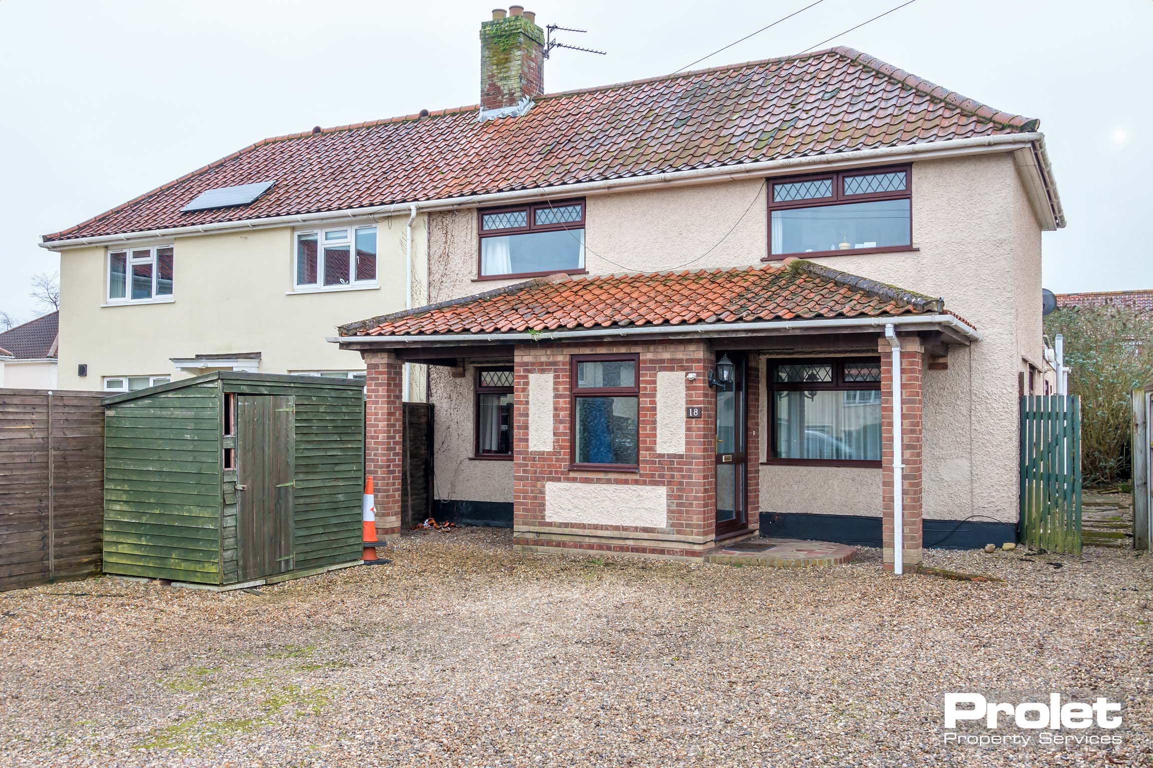 Semi-detached house with covered porch