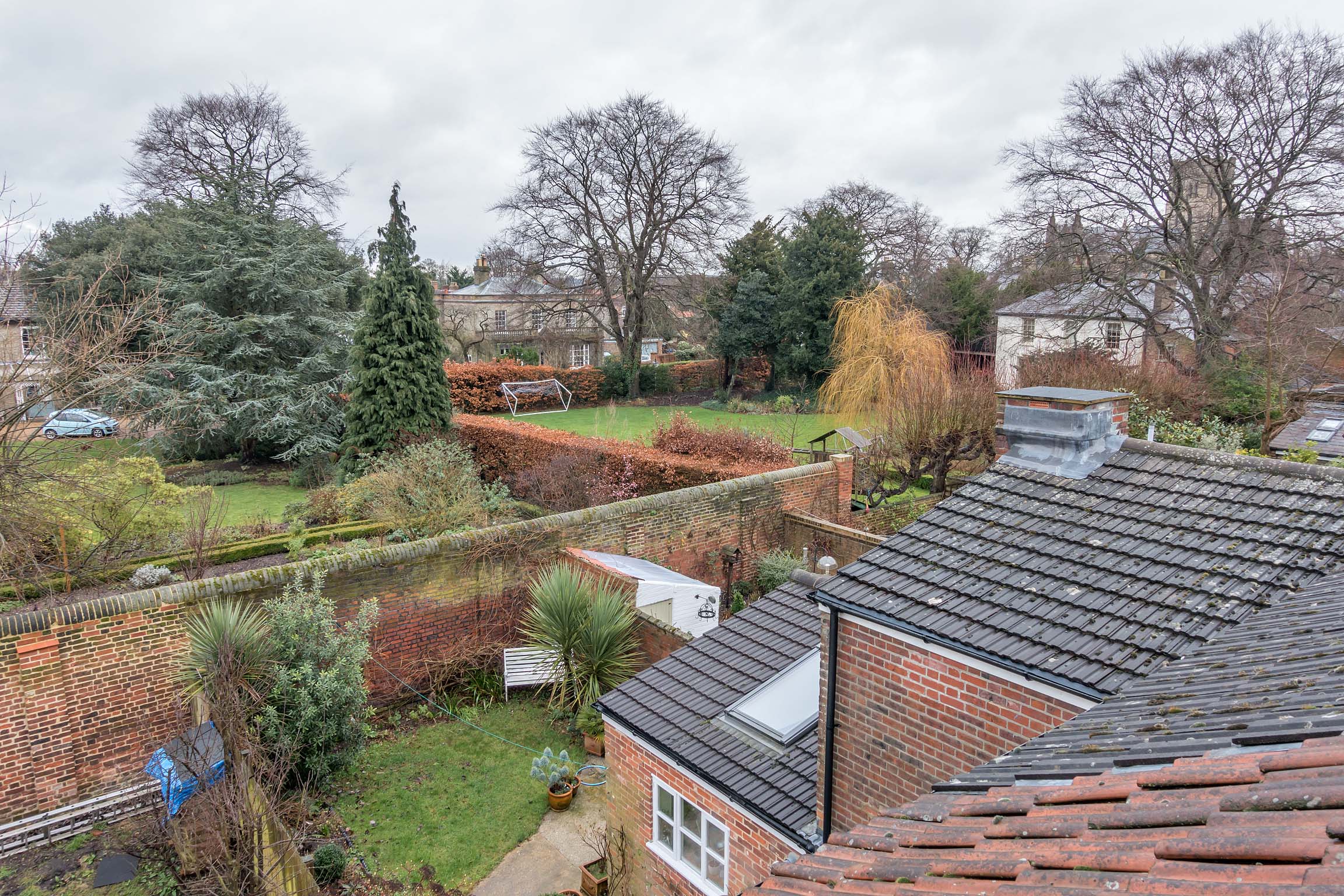 View from attic room over back gardens, view of cathedral
