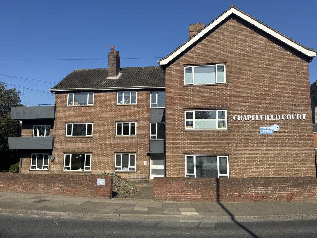 Exterior of chapelfield court, small block of flats on roundabout