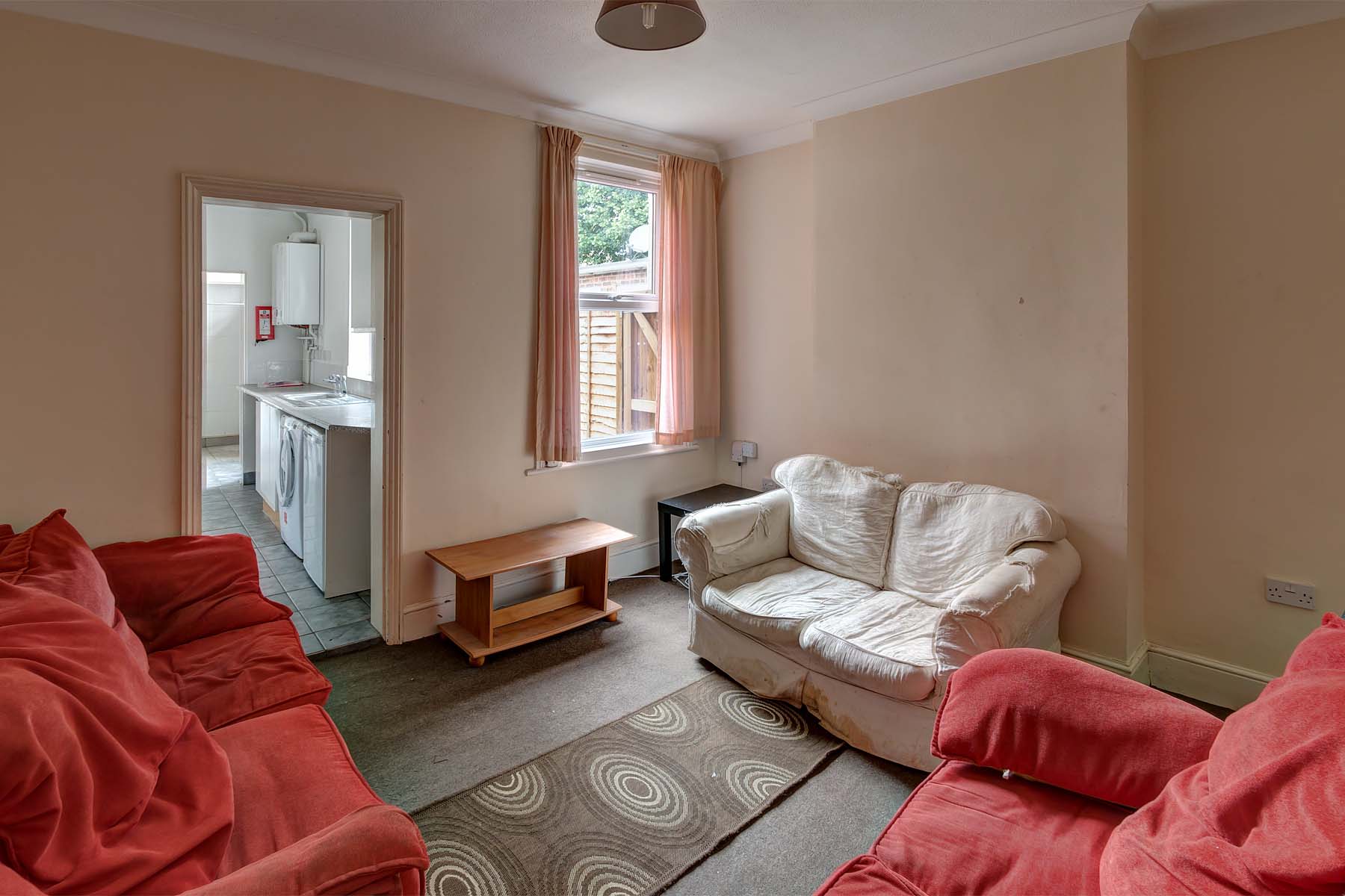 Living room with sofas and TV stand