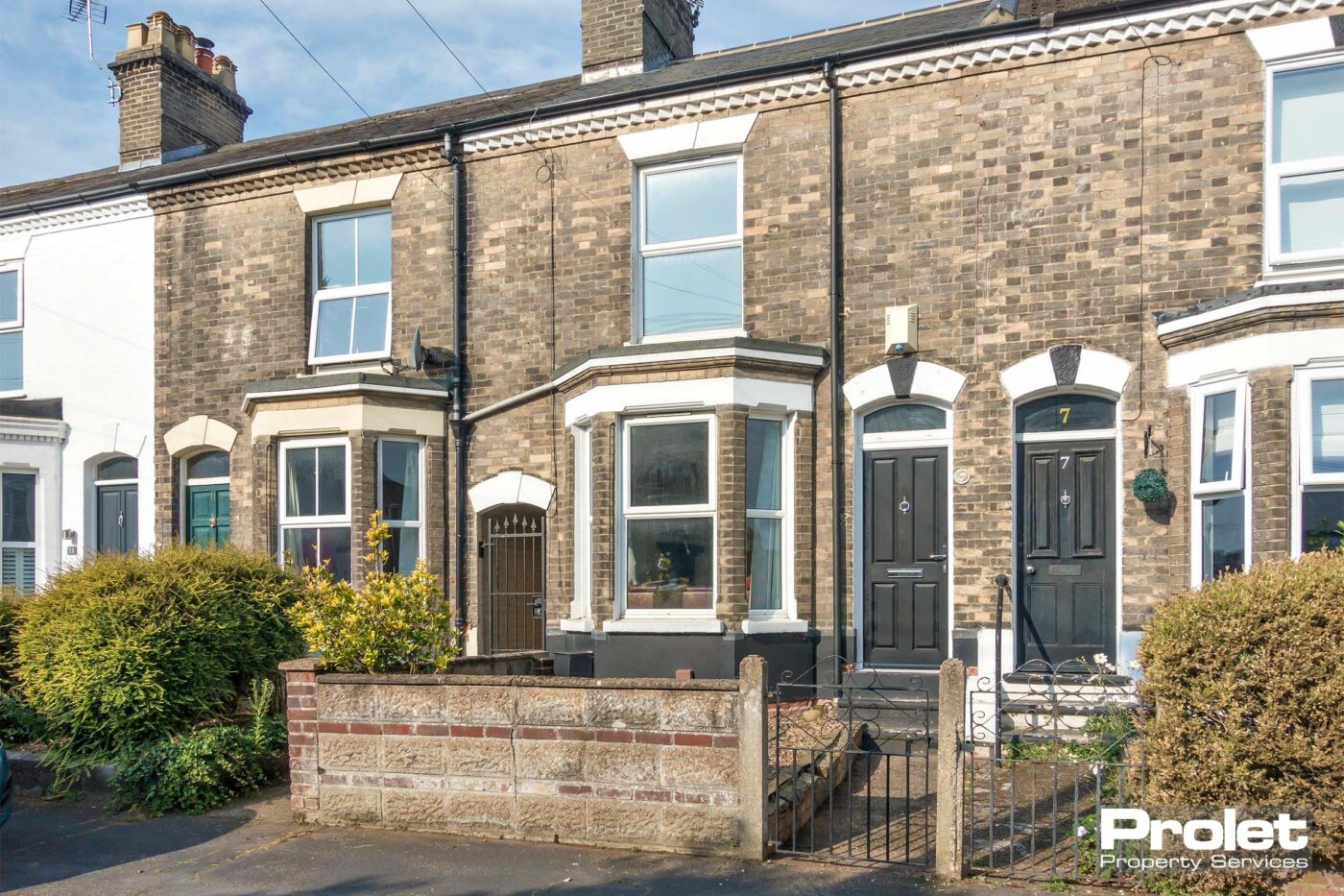 Brick terraced house with bay window