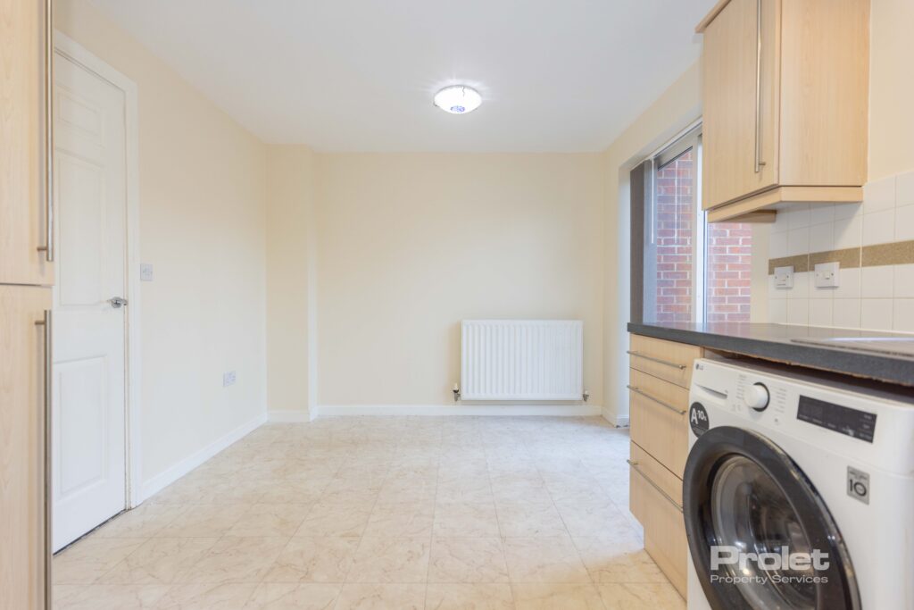 Large dining area with cream walls