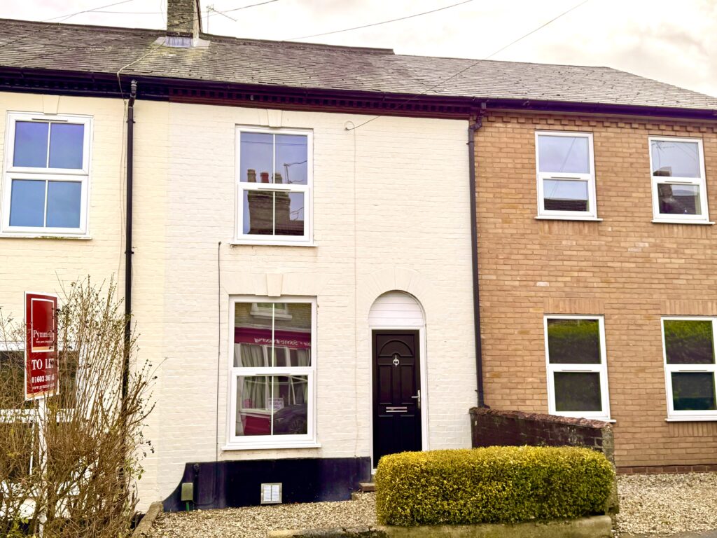 Terraced house with black front door