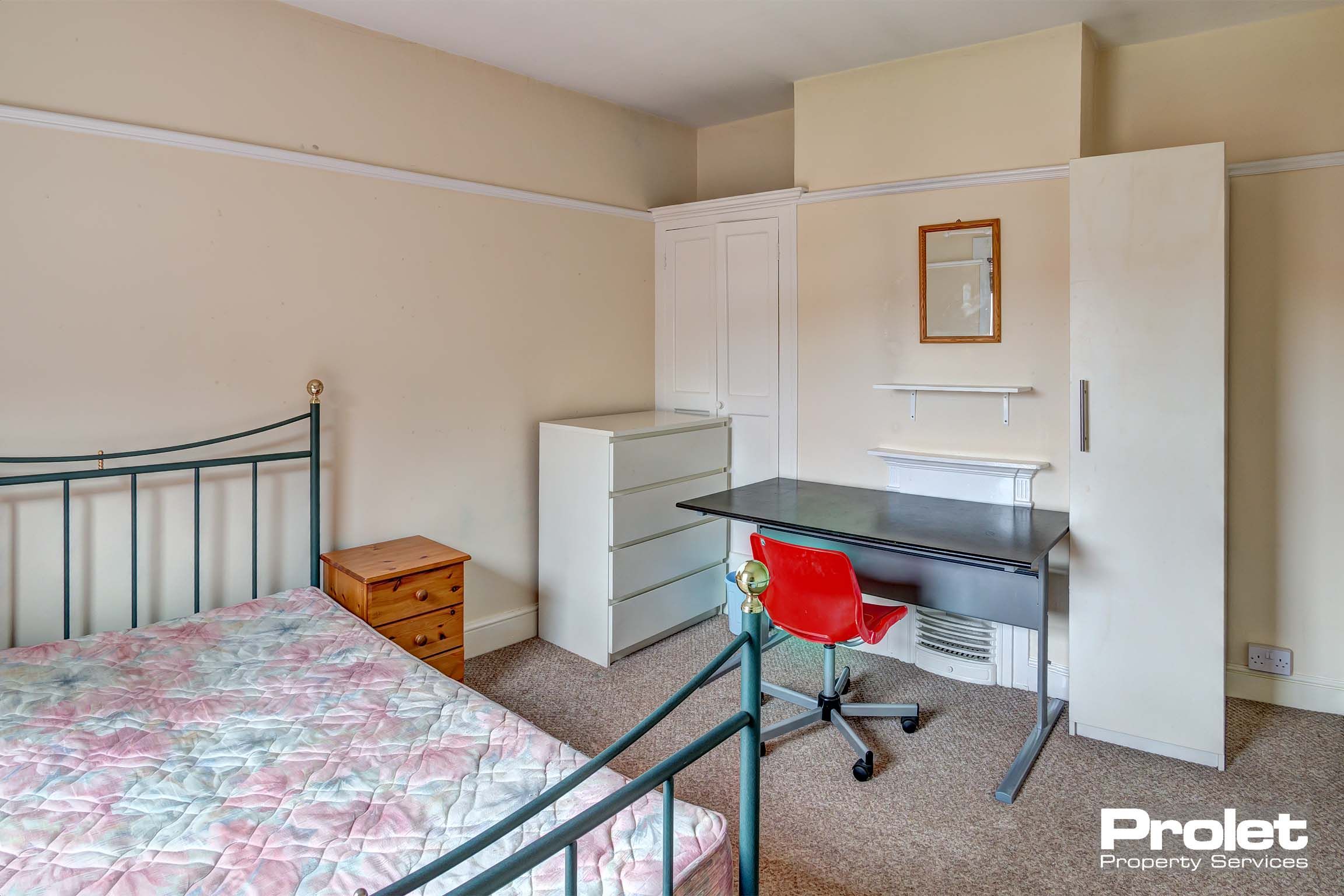 Bedroom with double bed and furnishings