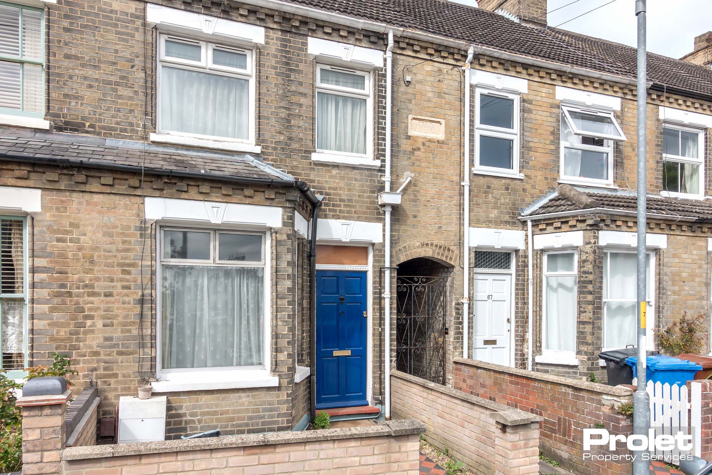 Terraced house with blue door