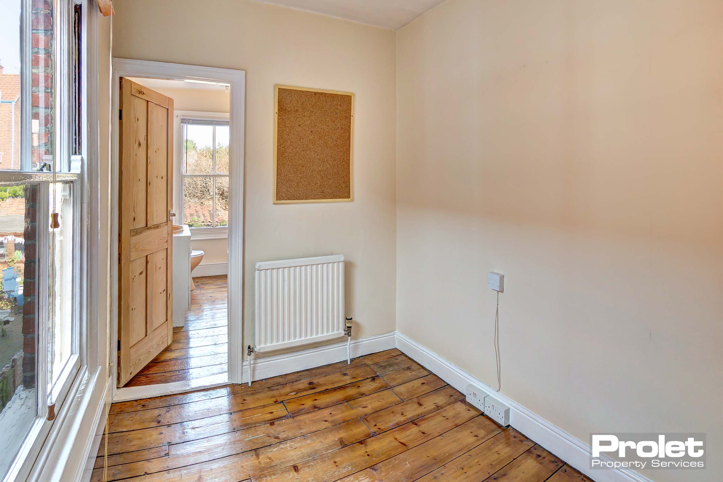 Box room leading to bathroom