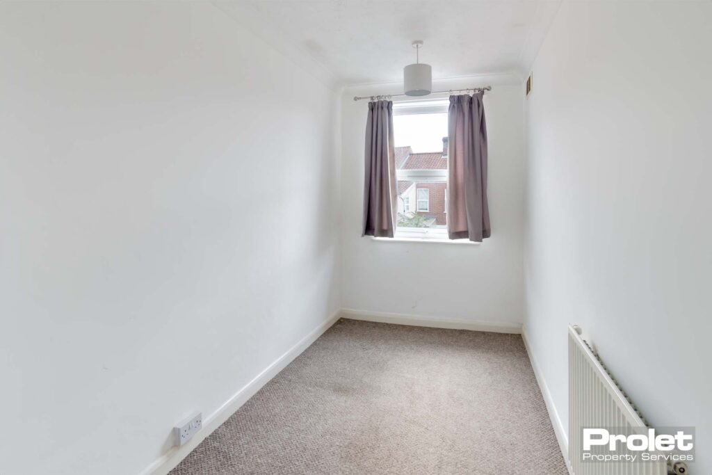 Box room with white walls