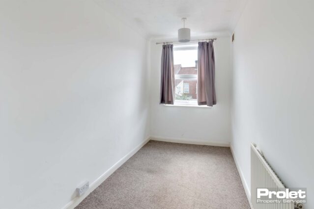 Box room with white walls