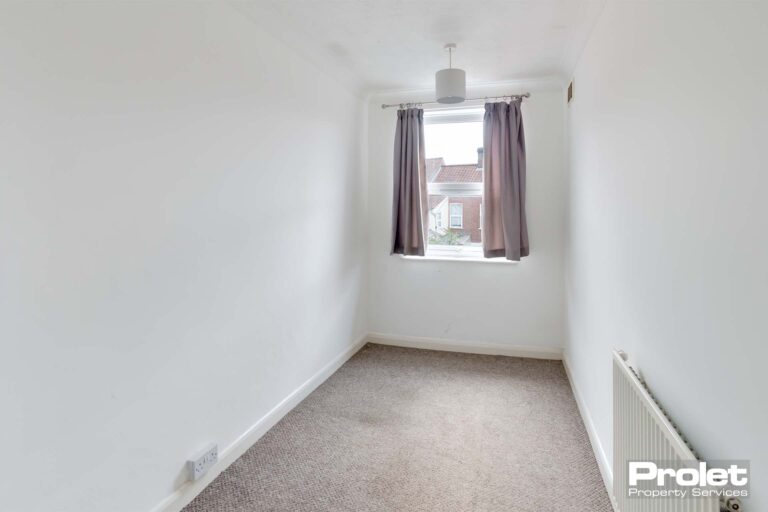 Box room with white walls