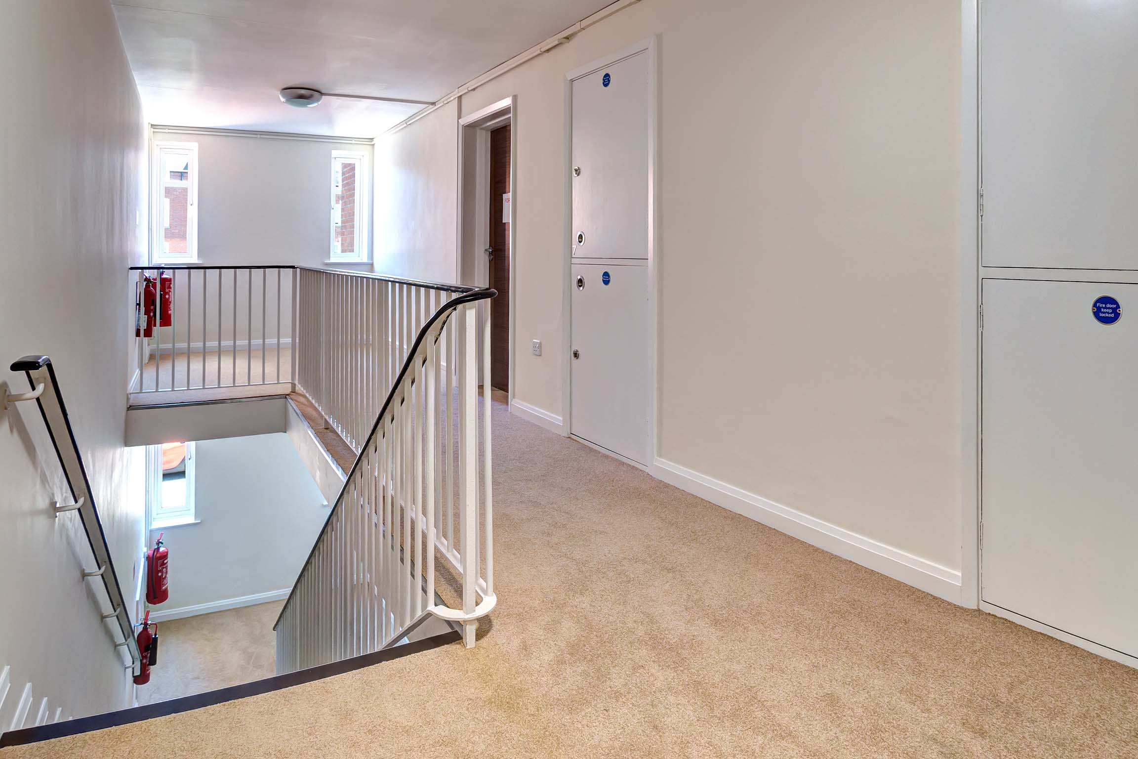 Communal staircase and hallway, leading to flat