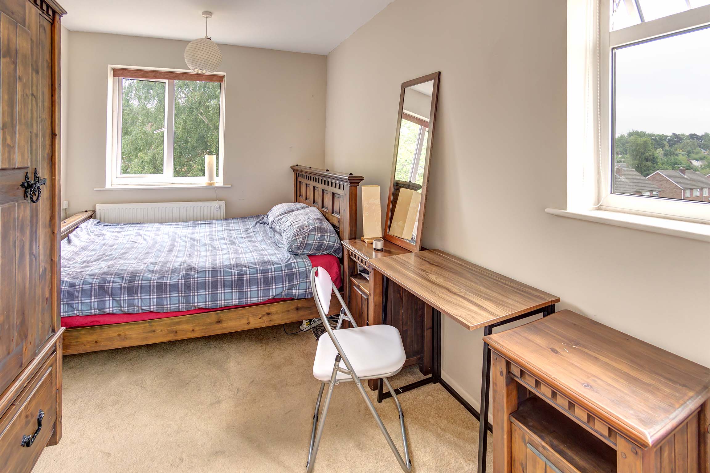 Bedroom with double bed, and desk