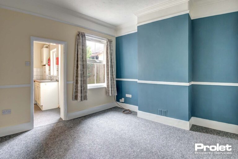 Grey carpet with blue and white painted walls