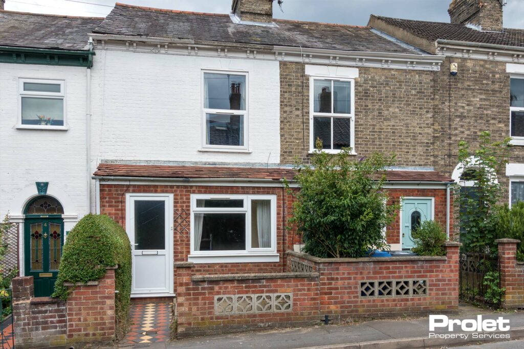 Terraced house with porch.