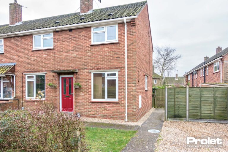 Red brick semi-detached house with driveway