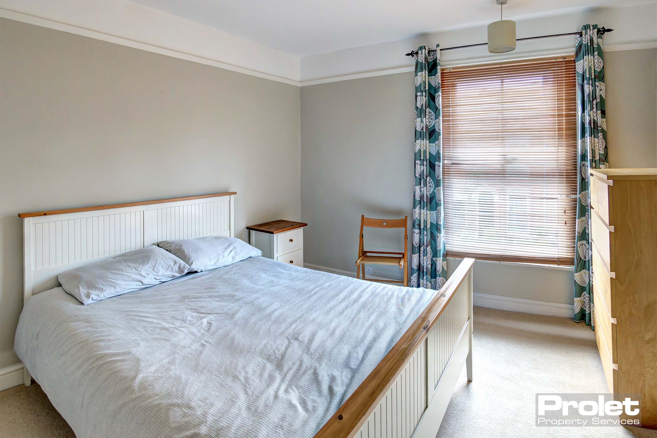 Double bedroom with double bedframe, wardrobe, drawers and bedside