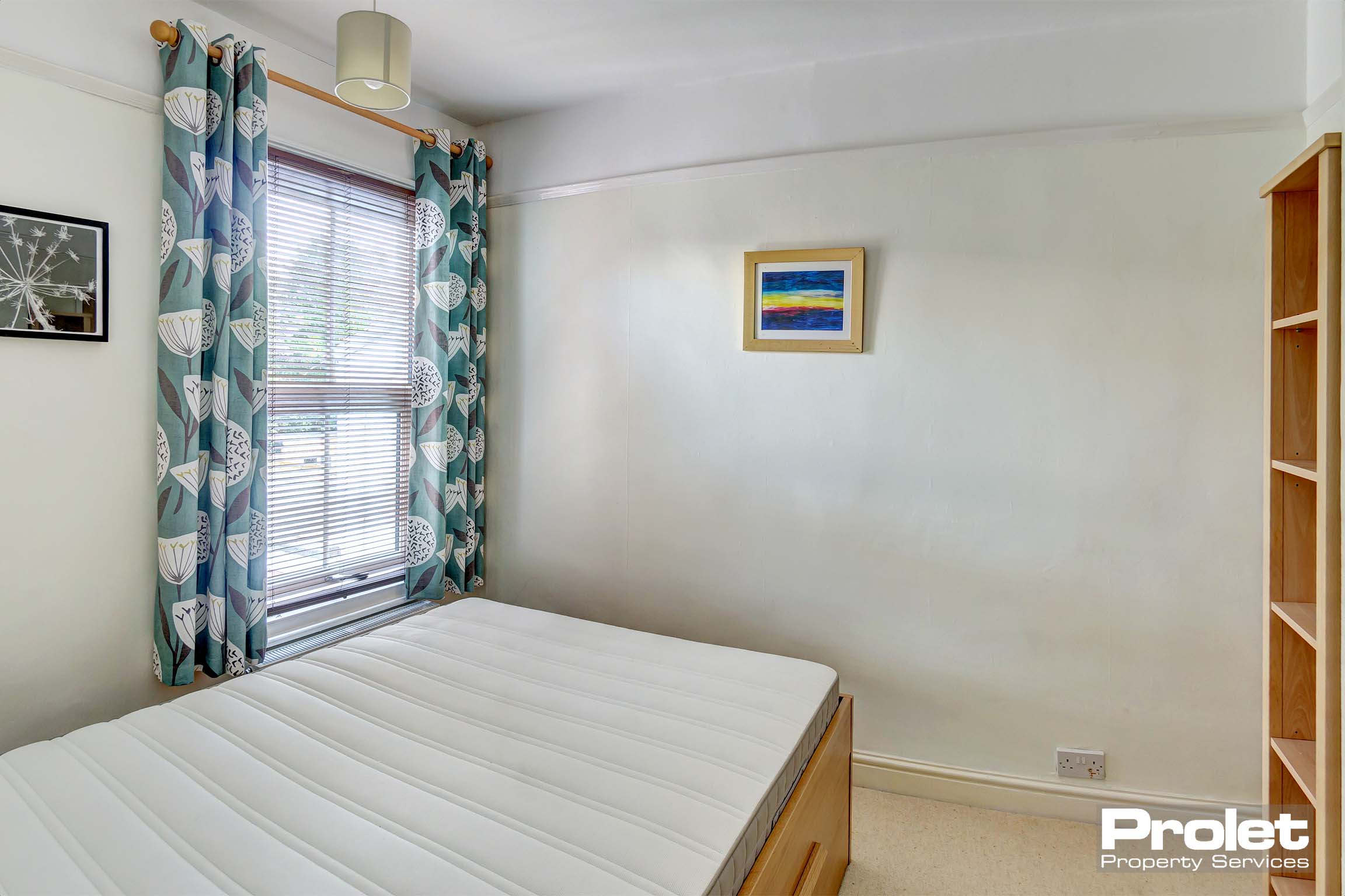 Double bed with storage unit and built in cupboard