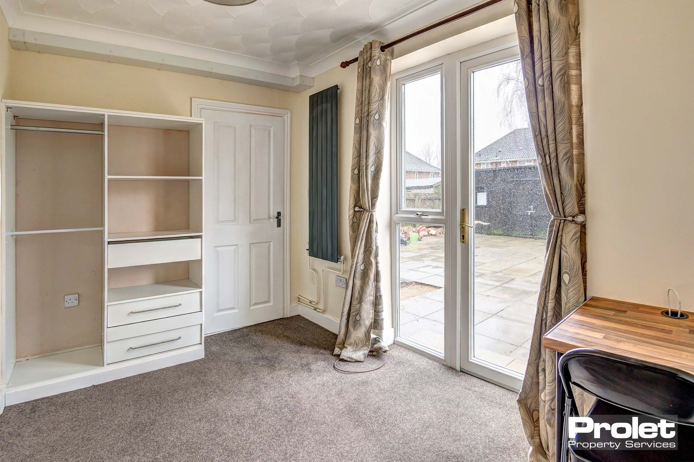 Bedroom with patio doors