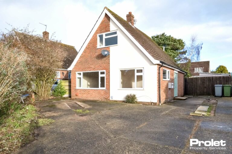 Brick exterior with driveway parking