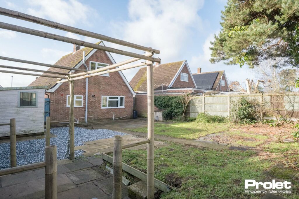 Slabs and lawn to rear garden