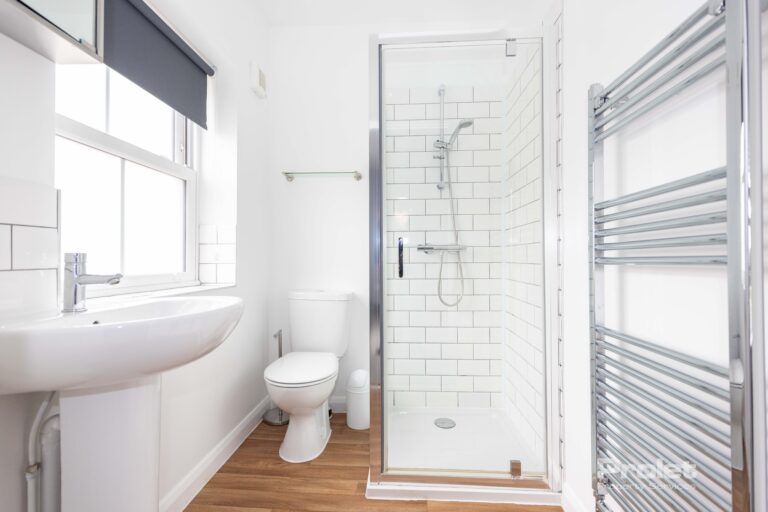 En-suite bathroom, with shower cubicle and sink