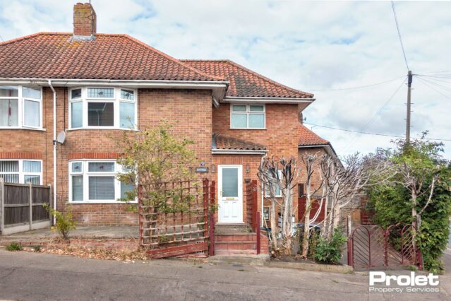 Semi-detached red brick house