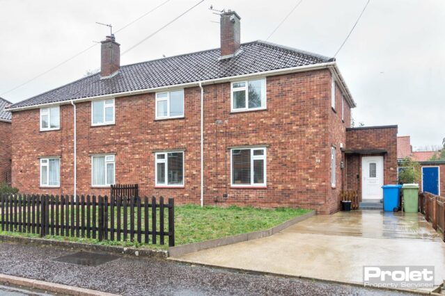 Red brick ground floor flat with large driveway and front garden