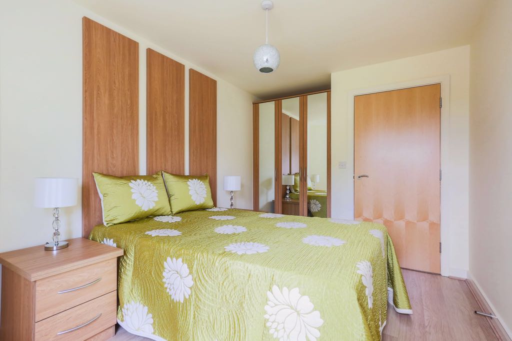 Double bedroom with smaller built in wardrobes
