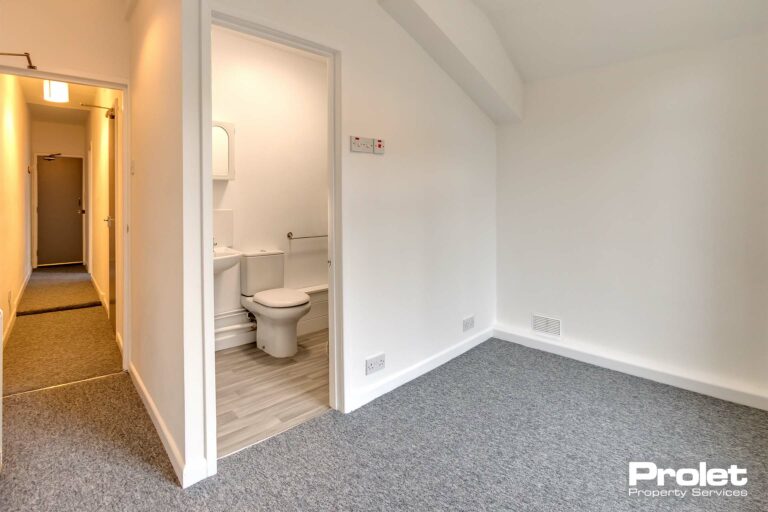 Bedroom with view of en-suite bathroom