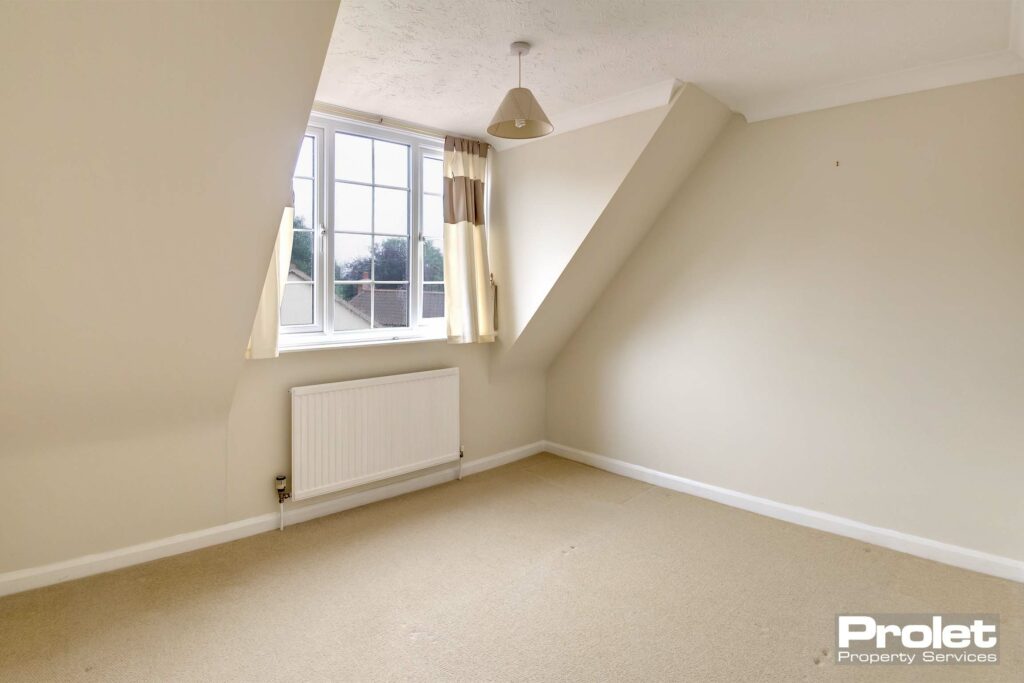 Magnolia walls with cream carpets.