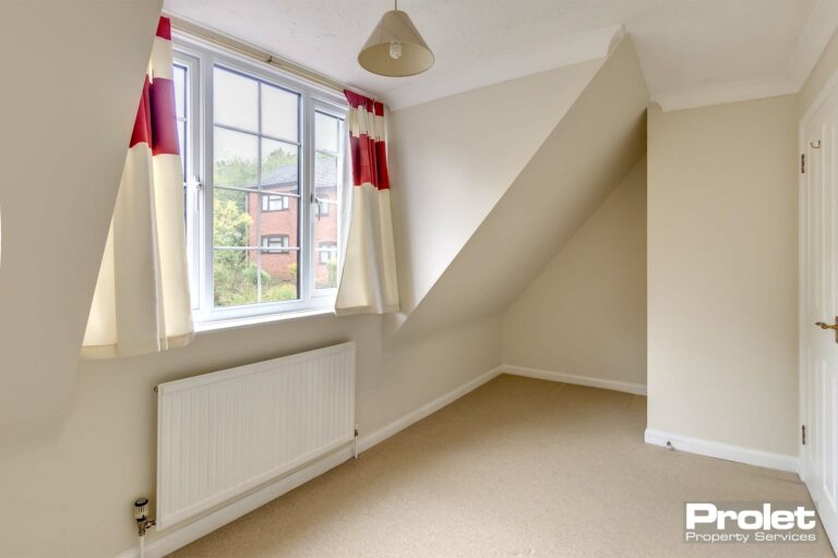 Magnolia walls with cream carpets.