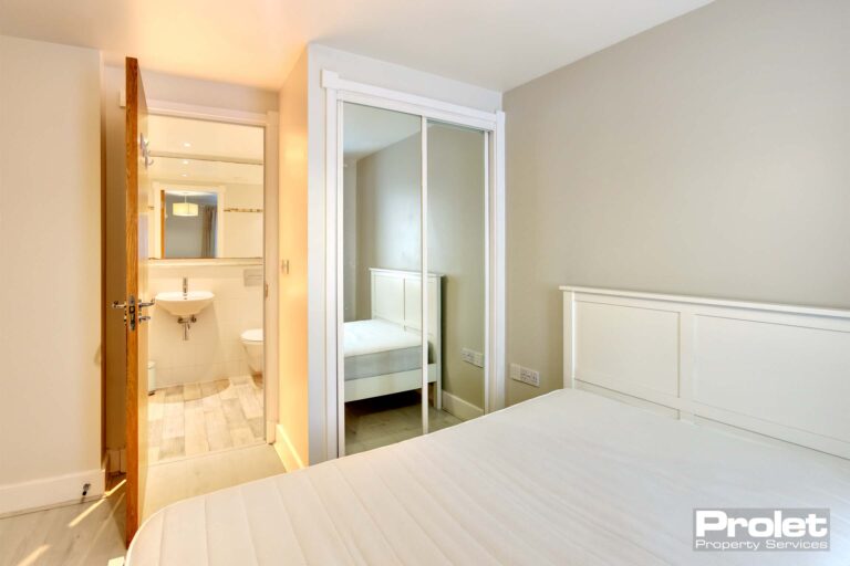 Double bedroom with mirrored built in wardrobe, double bed and ensuite