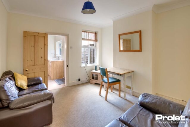 Dining area with small table and sofas
