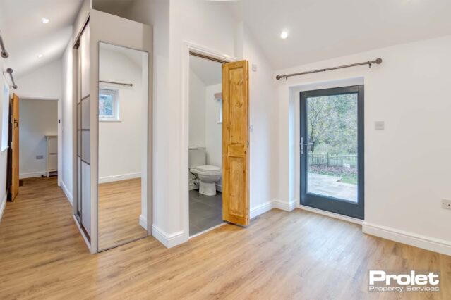 Wooden flooring and white walls