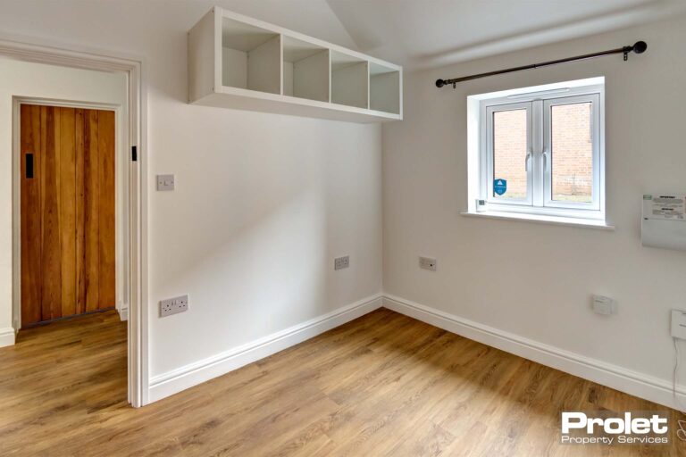Wooden flooring and white walls