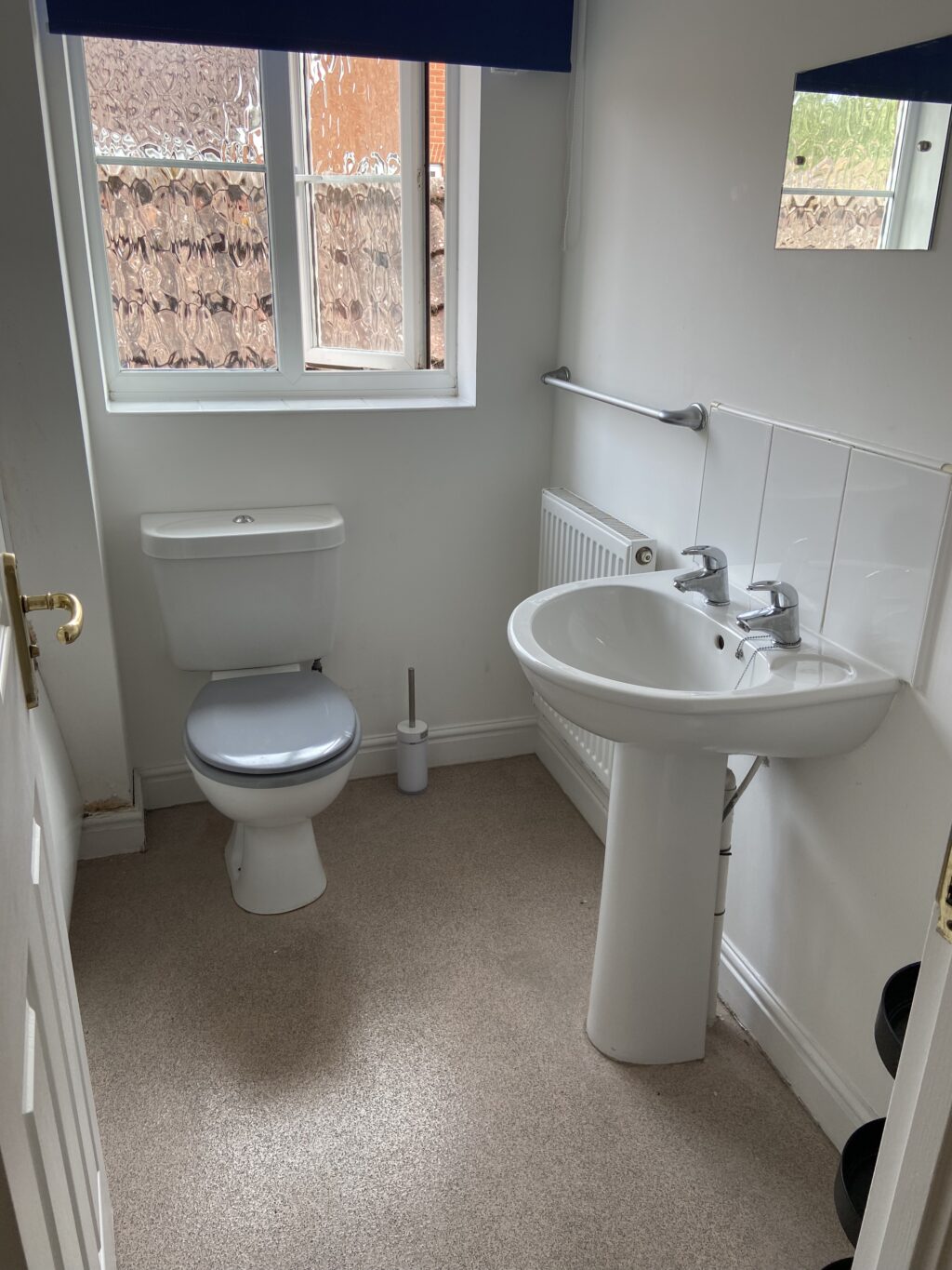 Family bathroom with toilet and sink